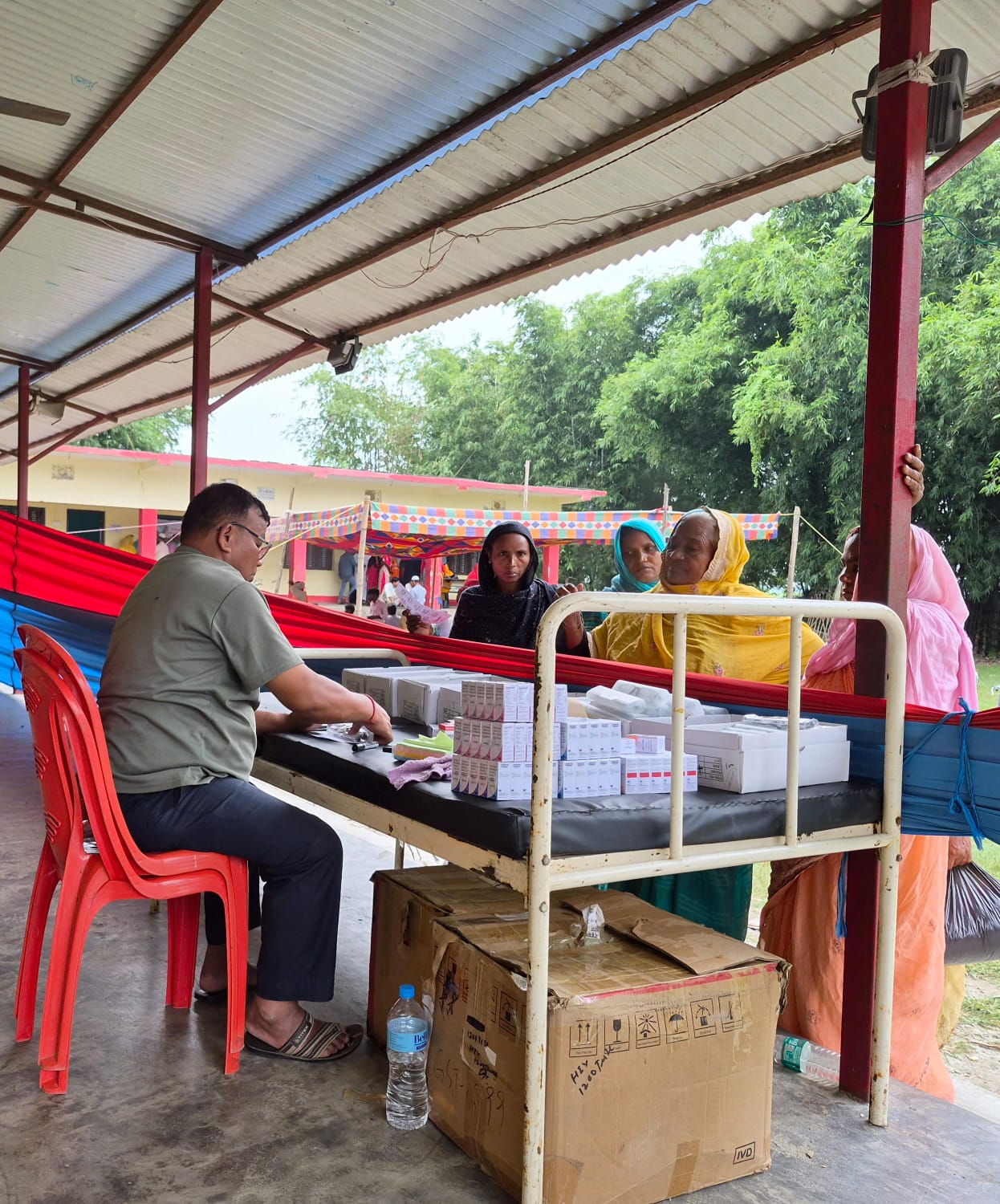 Medical team examining patients